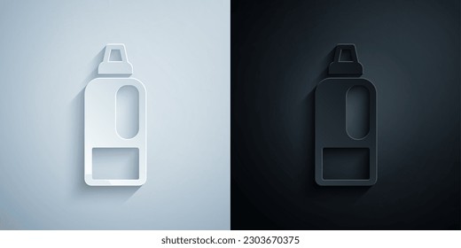 Paper cut Plastic bottle for laundry detergent, bleach, dishwashing liquid or another cleaning agent icon isolated on grey and black background. Paper art style. Vector