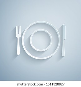 Paper cut Plate, fork and knife icon isolated on grey background. Cutlery symbol. Restaurant sign. Paper art style. Vector Illustration