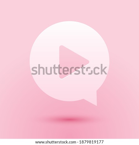 Paper cut Play in circle icon isolated on pink background. Paper art style. Vector.