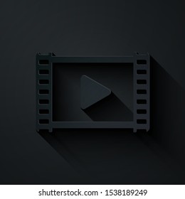 Paper cut Play Video icon isolated on black background. Film strip with play sign. Paper art style. Vector Illustration
