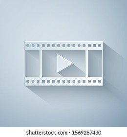 Paper cut Play Video icon isolated on grey background. Film strip with play sign. Paper art style. Vector Illustration