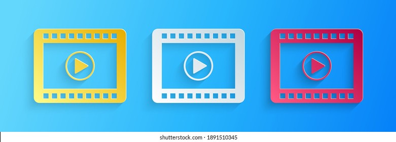 Paper cut Play Video icon isolated on blue background. Film strip with play sign. Paper art style. Vector.