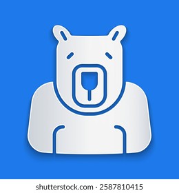 Paper cut Polar bear head icon isolated on blue background. Paper art style. Vector