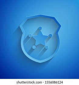 Paper cut Police badge icon isolated on blue background. Sheriff badge sign. Paper art style. Vector Illustration