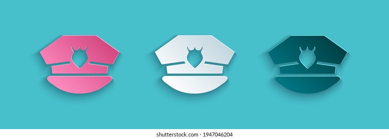 Paper cut Police cap with cockade icon isolated on blue background. Police hat sign. Paper art style. Vector