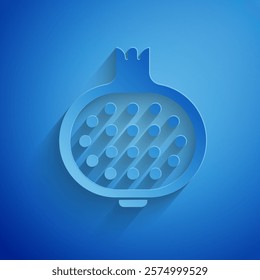 Paper cut Pomegranate icon isolated on blue background. Garnet fruit. Paper art style. Vector