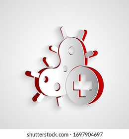 Paper cut Positive virus icon isolated on grey background. Corona virus 2019-nCoV. Bacteria and germs, cell cancer, microbe, fungi. Paper art style. Vector Illustration