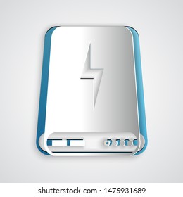 Paper cut Power bank icon isolated on grey background. Portable charging device. Paper art style. Vector Illustration