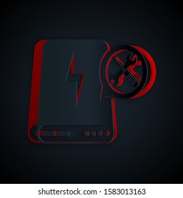 Paper cut Power bank with screwdriver and wrench icon isolated on black background. Adjusting, service, setting, maintenance, repair, fixing. Paper art style. Vector Illustration