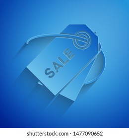 Paper cut Price tag with an inscription Sale icon isolated on blue background. Badge for price. Promo tag discount. Paper art style. Vector Illustration