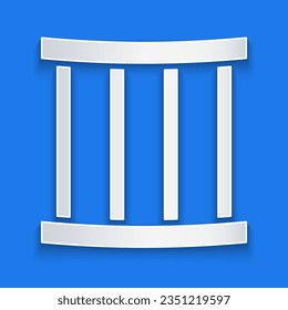Paper cut Prison window icon isolated on blue background. Paper art style. Vector