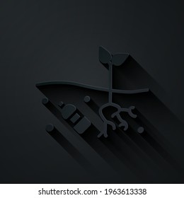 Paper cut The problem of pollution of the planet icon isolated on black background. The garbage, plastic, bags on the planet. Paper art style. Vector Illustration