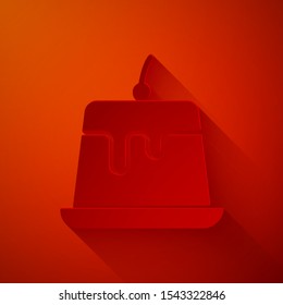 Paper cut Pudding custard with caramel glaze icon isolated on red background. Paper art style. Vector Illustration
