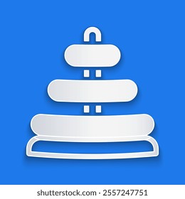 Paper cut Pyramid toy icon isolated on blue background. Paper art style. Vector