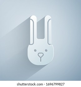 Paper cut Rabbit with ears icon isolated on grey background. Magic trick. Mystery entertainment concept. Paper art style. Vector Illustration