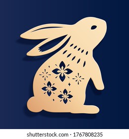 Paper cut rabbit silhouette with floral pattern, isolated on dark blue background, element for Mid-Autumn Festival and Easter use