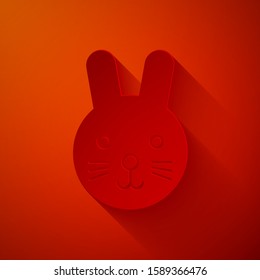 Paper cut Rabbit zodiac sign icon isolated on red background. Astrological horoscope collection. Paper art style. Vector Illustration