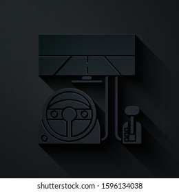 Paper cut Racing simulator cockpit icon isolated on black background. Gaming accessory. Gadget for driving simulation game. Paper art style. Vector Illustration