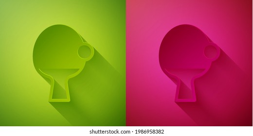 Paper cut Racket for playing table tennis icon isolated on green and pink background. Paper art style. Vector