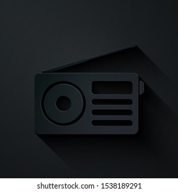 Paper cut Radio with antenna icon isolated on black background. Paper art style. Vector Illustration