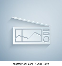 Paper cut Radio with antenna icon isolated on grey background. Paper art style. Vector Illustration