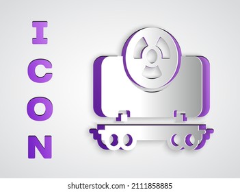 Paper cut Radioactive cargo train wagon icon isolated on grey background. Freight car. Railroad transportation. Paper art style. Vector