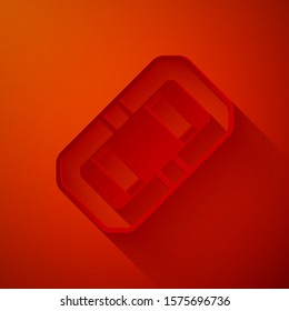 Paper cut Rafting boat icon isolated on red background. Inflatable boat. Water sports, extreme sports, holiday, vacation, team building. Paper art style. Vector Illustration