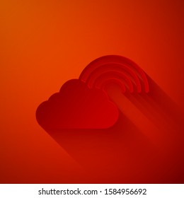 Paper cut Rainbow with clouds icon isolated on red background. Paper art style. Vector Illustration