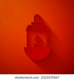 Paper cut Ramadan Kareem lantern icon isolated on red background. Paper art style. Vector Illustration