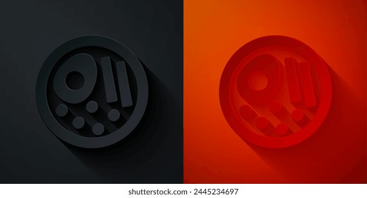 Paper cut Ramen soup bowl with noodles icon isolated on black and red background. Bowl of traditional asian noodle soup. Paper art style. Vector