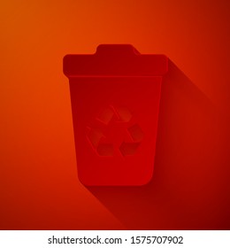 Paper cut Recycle bin with recycle symbol icon isolated on red background. Trash can icon. Garbage bin sign. Recycle basket sign. Paper art style. Vector Illustration