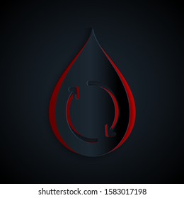 Paper cut Recycle clean aqua icon isolated on black background. Drop of water with sign recycling. Paper art style. Vector Illustration