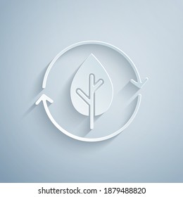Paper cut Recycle symbol and leaf icon isolated on grey background. Environment recyclable go green. Paper art style. Vector.