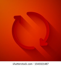 Paper cut Refresh icon isolated on red background. Reload symbol. Rotation arrows in a circle sign. Paper art style. Vector Illustration