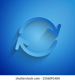 Paper cut Refresh icon isolated on blue background. Reload symbol. Rotation arrows in a circle sign. Paper art style. Vector Illustration