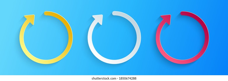 Paper cut Refresh icon isolated on blue background. Paper art style. Vector.