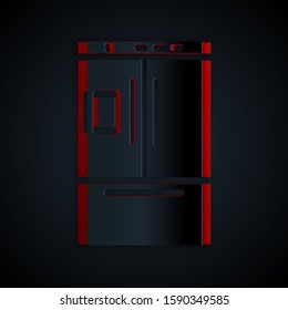 Paper cut Refrigerator icon isolated on black background. Fridge freezer refrigerator. Household tech and appliances. Paper art style. Vector Illustration