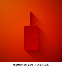 Paper cut Remote control icon isolated on red background. Paper art style. Vector Illustration