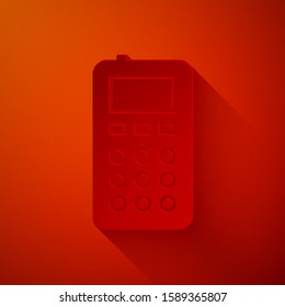 Paper cut Remote control icon isolated on red background. Paper art style. Vector Illustration