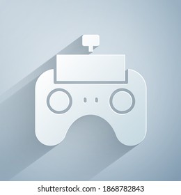 Paper cut Remote control icon isolated on grey background. Paper art style. Vector