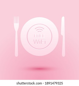 Paper cut Restaurant Free Wi-Fi zone icon isolated on pink background. Plate, fork and knife sign. Paper art style. Vector.