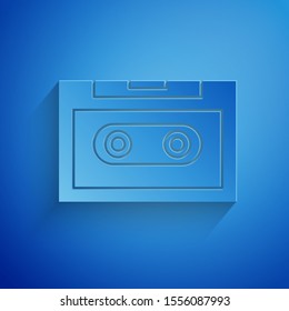 Paper cut Retro audio cassette tape icon isolated on blue background. Paper art style. Vector Illustration