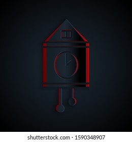 Paper cut Retro wall watch icon isolated on black background. Cuckoo clock sign. Antique pendulum clock. Paper art style. Vector Illustration