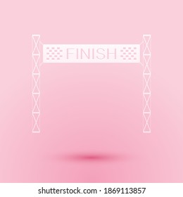 Paper cut Ribbon in finishing line icon isolated on pink background. Symbol of finish line. Sport symbol or business concept. Paper art style. Vector.