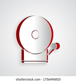 Paper cut Ringing alarm bell icon isolated on grey background. Fire alarm system. Service bell, handbell sign, notification symbol. Paper art style. Vector Illustration