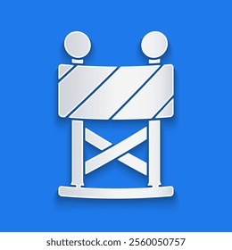 Paper cut Road barrier icon isolated on blue background. Symbol of restricted area which are in under construction processes. Repair works. Paper art style. Vector Illustration