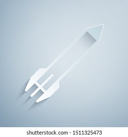 Paper cut Rocket icon isolated on grey background. Paper art style. Vector Illustration