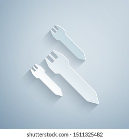 Paper cut Rocket icon isolated on grey background. Paper art style. Vector Illustration