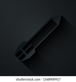 Paper cut Rocket icon isolated on black background. Paper art style. Vector Illustration