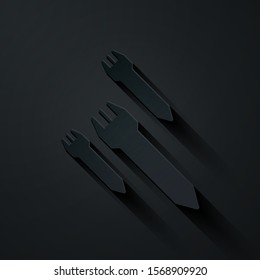 Paper cut Rocket icon isolated on black background. Paper art style. Vector Illustration